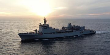 A side-view photograph of the Indian Navy’s indigenously built Survey Vessel (Large) (SVL) INS Ikshak (J23). The ship is seen sailing at sea.