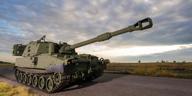 BAE Systems M109A7 Paladin Self-Propelled Howitzer and M992A3 ammunition carrier set.