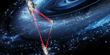 Artist’s impression of the LISA mission constellation showing three spacecrafts connected by laser beams to detect gravitational waves in space.