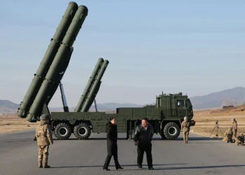 North Korean leader Kim Jong Un supervises the test-fire of an upgraded large-caliber multiple rocket launcher, January 2026.