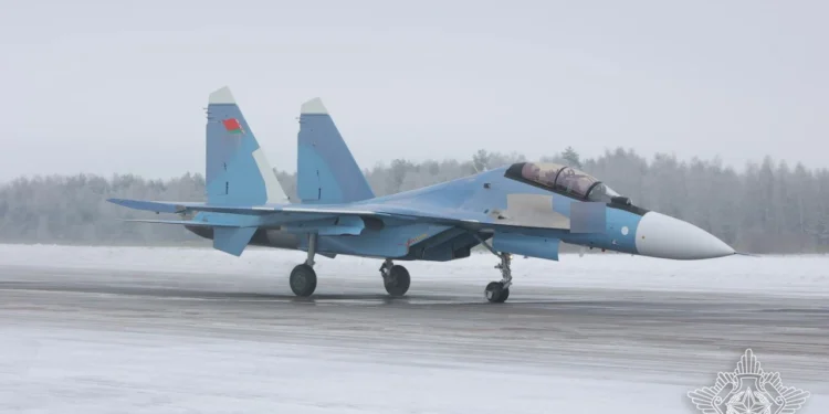 Close-up view of the new Su-30SM2 multirole fighter jet delivered to the Belarus Air Force, highlighting the engine nozzles and aerodynamic structure.