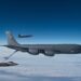A KC-135 Stratotanker from the 168th Wing refueling an F-22 Raptor over Alaska.
