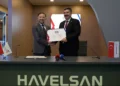 TUSAŞ and HAVELSAN executives sign the agreement for the KOVAN Next Generation Business Management System at SAHA EXPO 2026