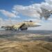 Two F-15IA fighter jets with Israeli Air Force markings flying over a desert landscape.