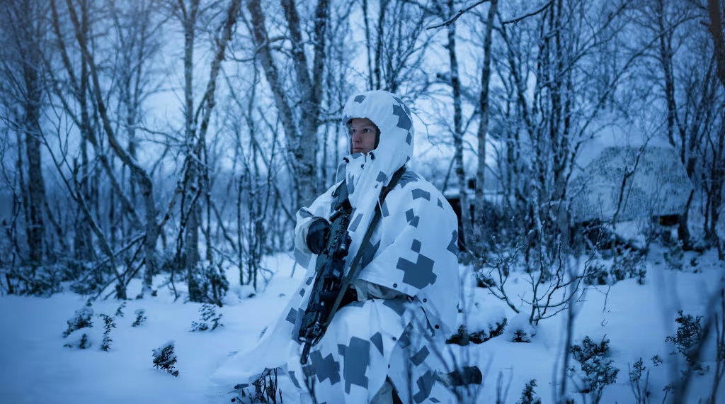 Saab Barracuda Poncho multispectral individual camouflage and thermal management system.