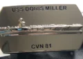 Commemorative plaque of the USS Doris Miller (CVN 81) aircraft carrier.