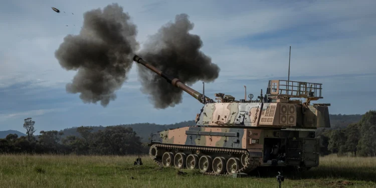 Australian Army's new AS9 Huntsman self-propelled howitzer during a live-fire training exercise at Puckapunyal.