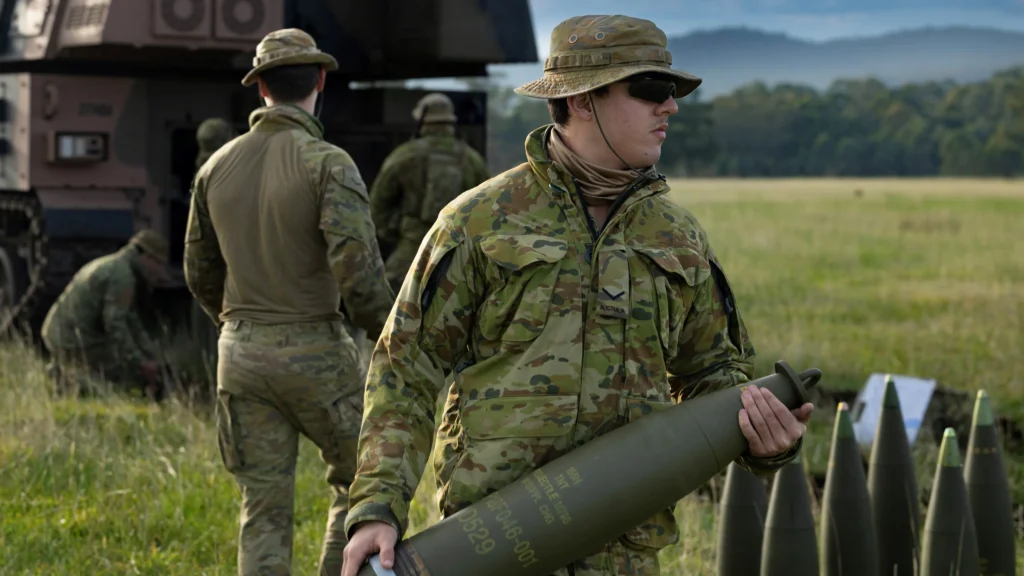 Australian Royal Artillery soldier preparing 155mm ammunition for the AS9 Huntsman.