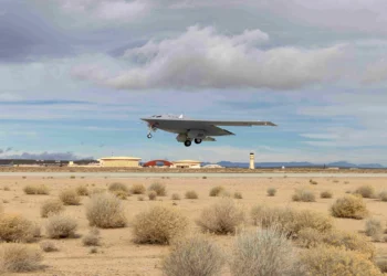 A B-21 Raider conducts flight tests at Edwards Air Force Base, California, marking progress toward becoming the backbone of the U.S. Air Force bomber fleet