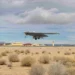 A B-21 Raider conducts flight tests at Edwards Air Force Base, California, marking progress toward becoming the backbone of the U.S. Air Force bomber fleet