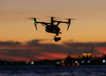 Honeywell Kestrel compact navigation system integrated into an unmanned aerial vehicle flying during sunset.