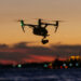 Honeywell Kestrel compact navigation system integrated into an unmanned aerial vehicle flying during sunset.
