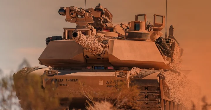 An M1A2 Abrams SEPv3 main battle tank of the US Army conducting operational tests in a desert environment.
