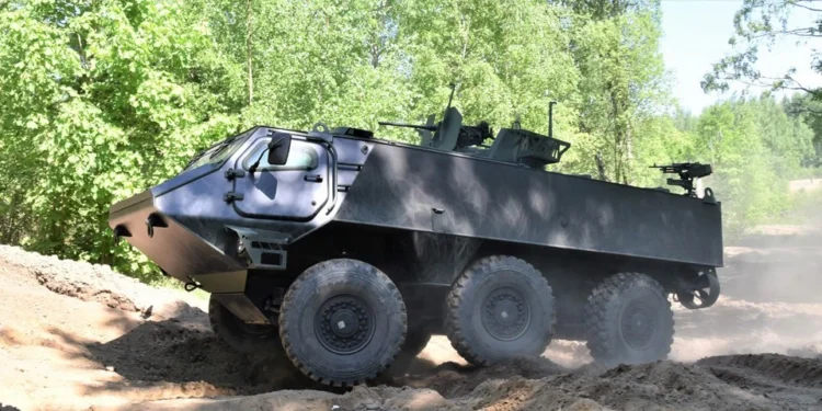 Patria 6x6 armored vehicle on an off-road terrain during field operations for the CAVS program