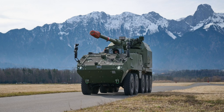 KNDS AGM artillery gun module integrated onto GDELS-Mowag Piranha IV 8x8 platform for the Swiss Army.