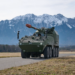 KNDS AGM artillery gun module integrated onto GDELS-Mowag Piranha IV 8x8 platform for the Swiss Army.