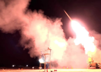 Night launch of a THAAD missile interceptor demonstrating the solid rocket boost motor in action.