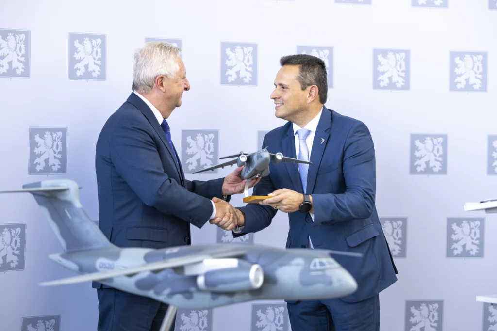 Embraer representatives and Czech Air Force officials during the official handover ceremony of the first C-390 Millennium in Prague.