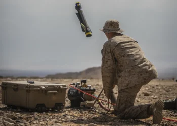 A US Marine launching a Switchblade kamikaze drone, representing the system included in the US FMS approval for Greece.