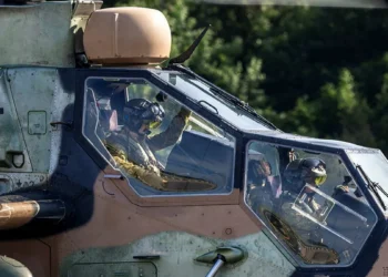 Pilots inside the cockpit of an Australian Army ARH Tiger attack helicopter on duty during the Keris Strike exercise in Malaysia