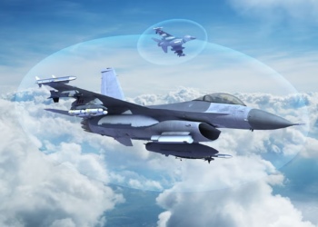 Peru F-16 Block 70 fighter jet equipped with L3Harris Viper Shield electronic warfare system, shown in flight surrounded by a digital protection shield
