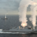 Rheinmetall GMF 140 guided missile frigate firing missiles during a demonstration at sea.