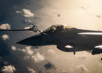 A Eurofighter Typhoon aircraft conducting an aerial refuelling mission in flight.