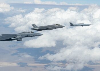 FQ-42 Vengeance flying in formation with F-35 and F-15E